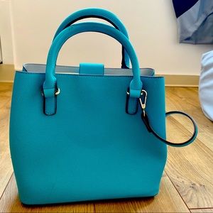 Crossbody bag (not branded).